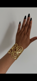 Handmade swirl cuff